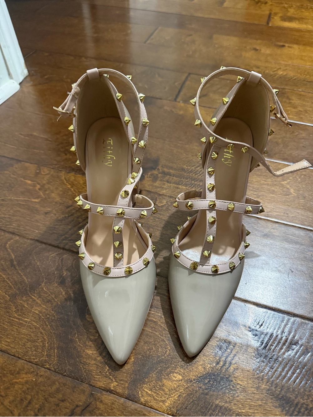 Studded Patent Pointed-Toe Pumps in Cream with Blush Straps